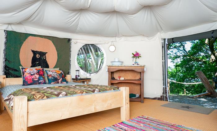 bed in yurt, Wales glamping